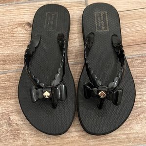 New Kate spade black flip flops size 7-8